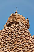 The main temple, in front an open pavilion shelters a huge monolithic Nandi. Details of the main tower. 